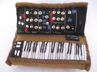 Illustration for article titled Miniature Synthesizer Replicas Cast in Felt Will Rock Your Tiny Mind